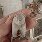 Miniatuur Oude Speelgoedbeer op Wielen – Handgemaakt in Brocante Stijl 1:12